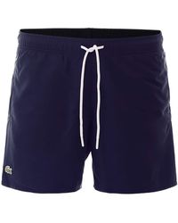 lacoste keith haring swim trunks