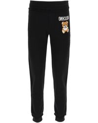 Moschino Track pants and sweatpants for Women - Up to 55% off at 