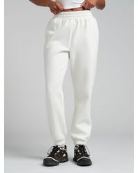Comfrt - Travel Essentials Sweatpants - Lyst