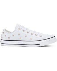 black converse with gold studs