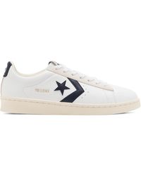white leather converse low womens