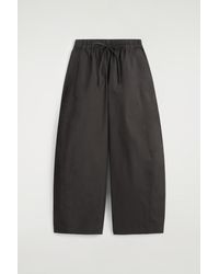 COS - Elasticated Barrel-Leg Pants - Lyst