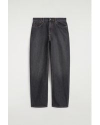 COS - Inlet Curved-Leg Jeans - Lyst