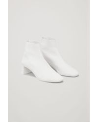 cos sculptural leather ankle boots