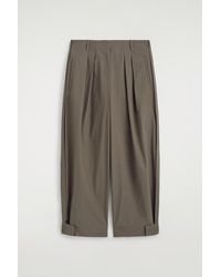 COS - Pleated Tapered Utility Pants - Lyst