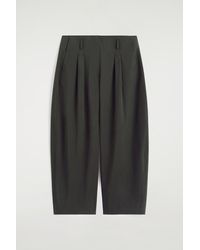 COS - Pleated Cotton Balloon-Leg Trousers - Lyst