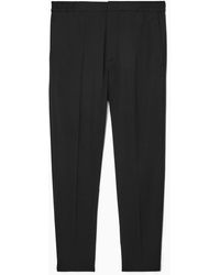 COS - Tapered Elasticated Wool-twill Trousers - Lyst