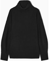 COS - Oversized Wool Roll-neck Sweater - Lyst