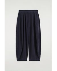 COS - Fluid Topstitched Barrel-Leg Trousers - Lyst