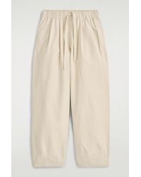 COS - Cotton Tapered Drawstring Trousers - Lyst