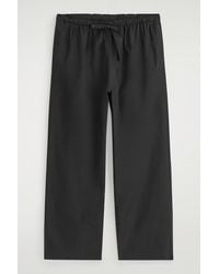 COS - Drawstring Cotton Trousers - Lyst
