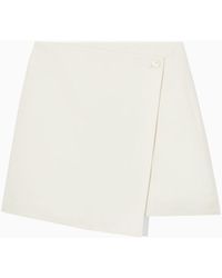 COS - Asymmetric Mini Wrap Skirt - Lyst