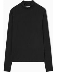 COS - Relaxed Long-sleeved Roll-neck Top - Lyst