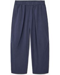 COS - Pleated Wide-leg Chambray Pants - Lyst