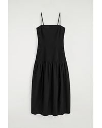 COS - Sculpted Dropped-Waist Midi Dress - Lyst