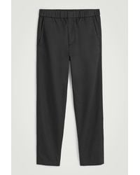 COS - Twill Tapered Pants - Lyst