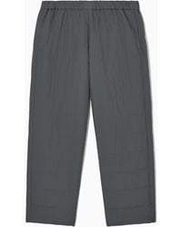 COS - Quilted Padded Trousers - Lyst