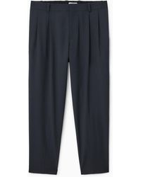 COS - Pleated Technical Wool Pants - Lyst