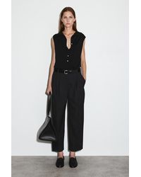 COS - Hose Aus Woll-mix Mit Barrel-bein Und Falten - Lyst