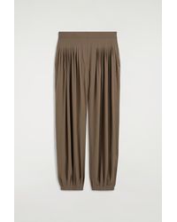 COS - Pleated Crepe Balloon Trousers - Lyst