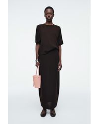 COS - Kleine Beuteltasche - Lyst