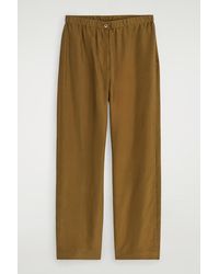 COS - Relaxed Silk Trousers In Beige - Lyst