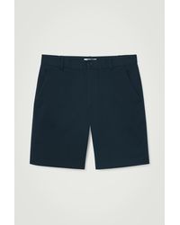 COS - Klassische Chino-shorts - Lyst