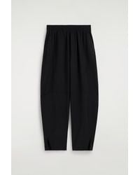 COS - Panelled Elasticated Barrel-Leg Trousers - Lyst