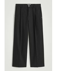 COS - Pleated Wide-leg Denim Pants - Lyst