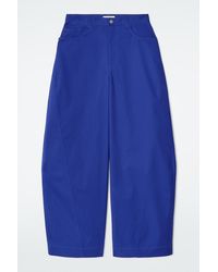 COS - Deconstructed Cotton Barrel-Leg Trousers - Lyst