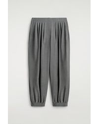 COS - Pleated Wool-Blend Balloon-Leg Pants - Lyst