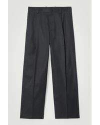 COS - Relaxed Pleated Cotton Wide-leg Trousers - Lyst