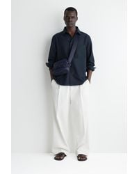 COS - Transit Umhängetasche - Lyst