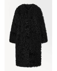 COS - The Oversized Reversible Shearling Coat - Lyst