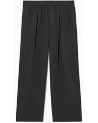 COS - Pleated Wide-leg Chambray Pants - Lyst