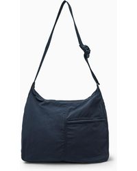 COS - Slouchy Nylon Messenger Bag - Lyst