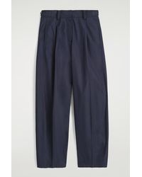 COS - Pleated Cotton Barrel-Leg Trousers - Lyst