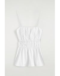 COS - Gathered Cotton Peplum Top - Lyst
