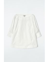 COS - Voluminous Boat-neck Cotton Blouse - Lyst