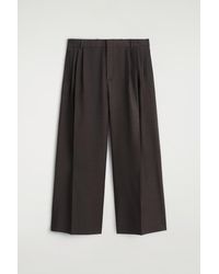 COS - Pleated Wool Wide-Leg Trousers - Lyst