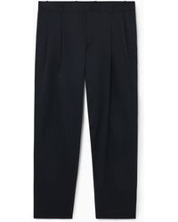COS - Pleated Nylon Pants - Tapered - Lyst