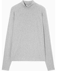 COS - Relaxed Long-sleeved Roll-neck Top - Lyst