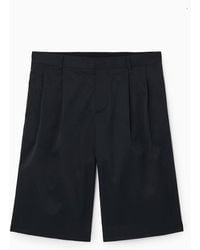 COS - Lange Shorts Aus Nylon - Lyst