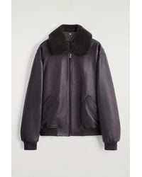 COS - Lederjacke Mit Kragen Aus Shearling - Lyst