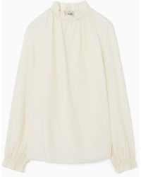 COS - Ruffled High-neck Blouse - Lyst