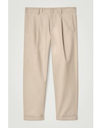 COS - Cotton Relaxed-Fit Tapered Turn-Up Trousers - Lyst