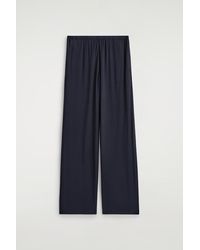 COS - Fluid Jersey Wide-Leg Trousers - Lyst