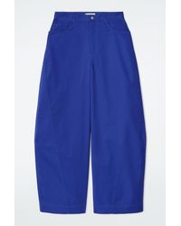 COS - Deconstructed Cotton Barrel-Leg Trousers - Lyst