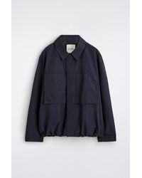 COS - Packable-Hood Windbreaker Jacket - Lyst