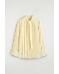 COS - Pleated Bow-Detail Blouse - Lyst